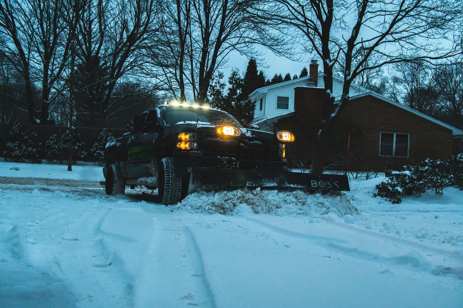 Greenworks plow truck working through fresh snow
