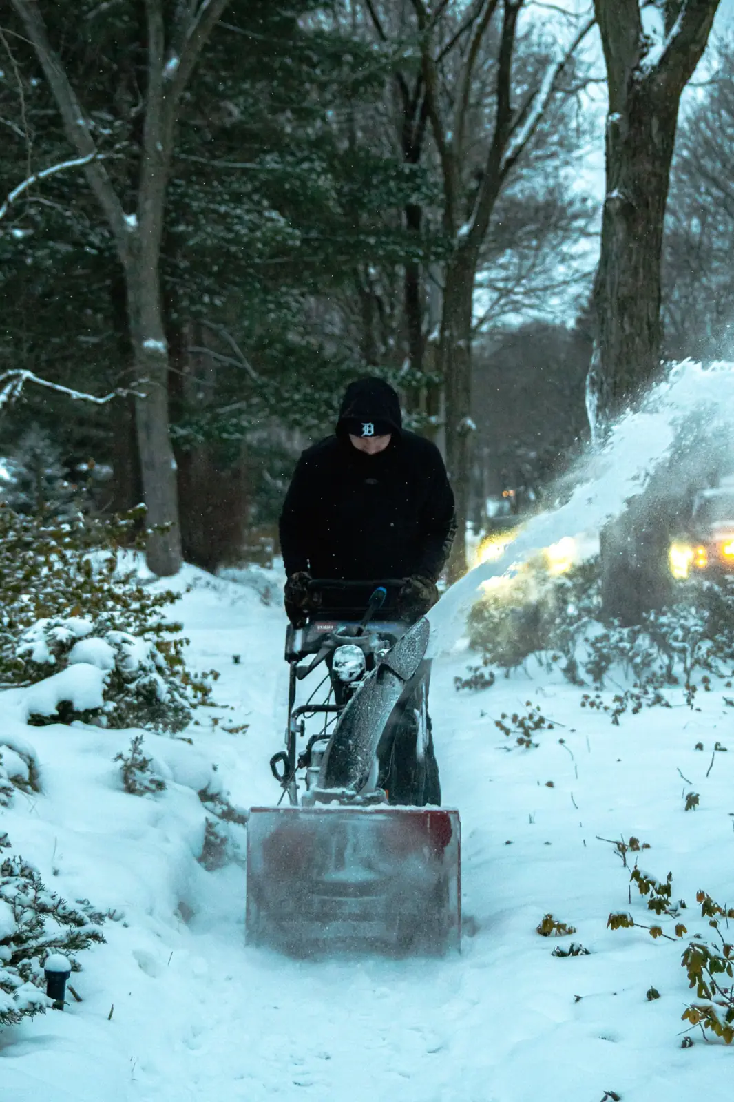 Greenworks snow-removal truck working in a residential neighborhood