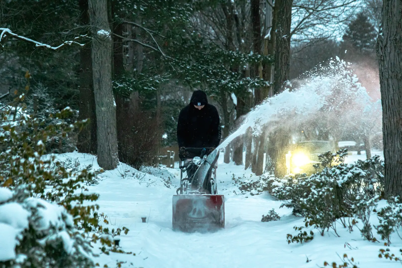Greenworks plow truck clearing a snowy roadway