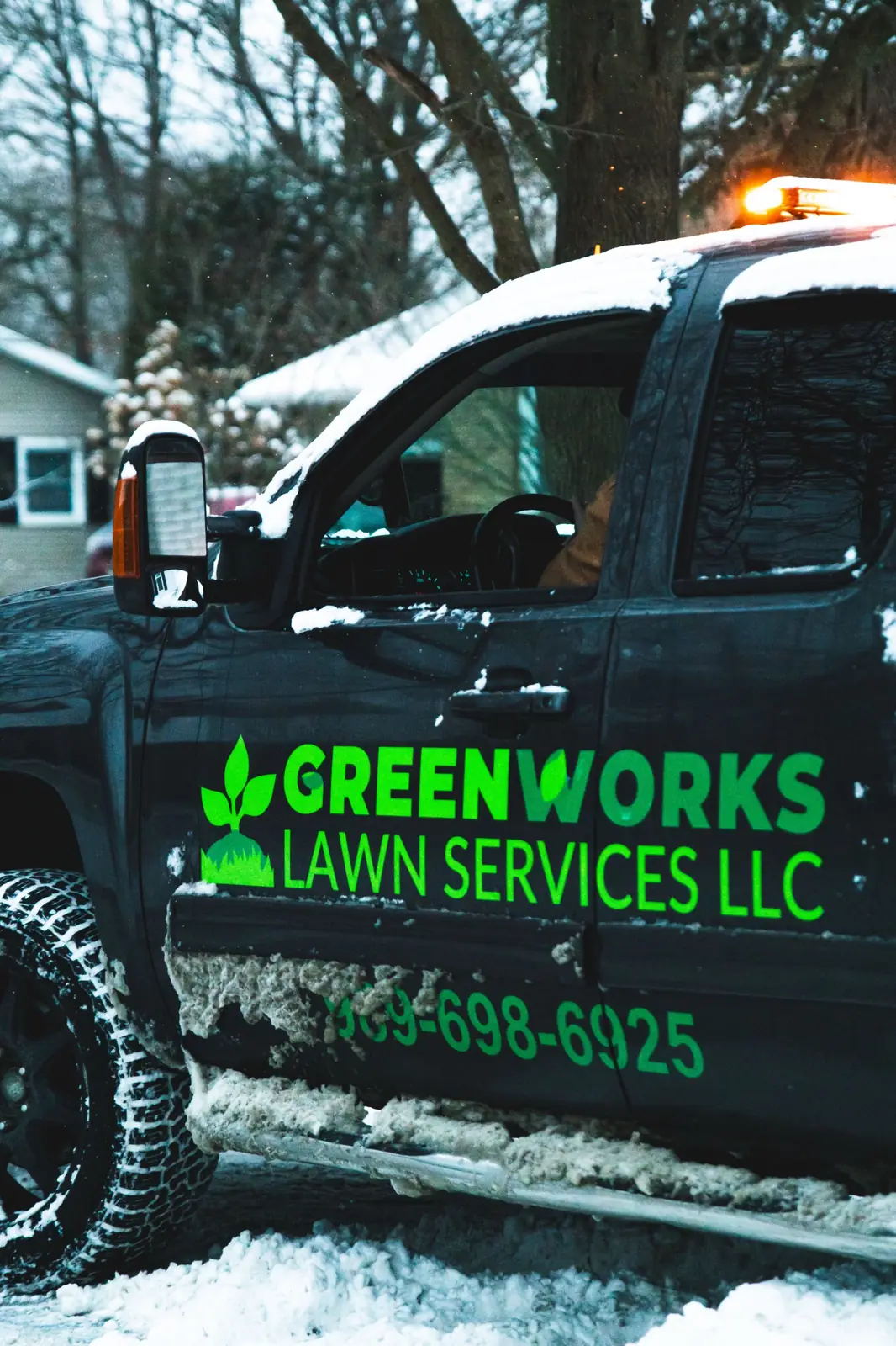 Greenworks plow truck working through winter conditions